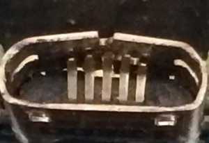 This image shows how the USB port pins can be damaged and bent
